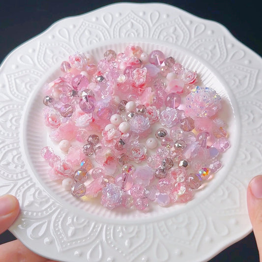The blossoming confetti glass beads & soft rober flowers